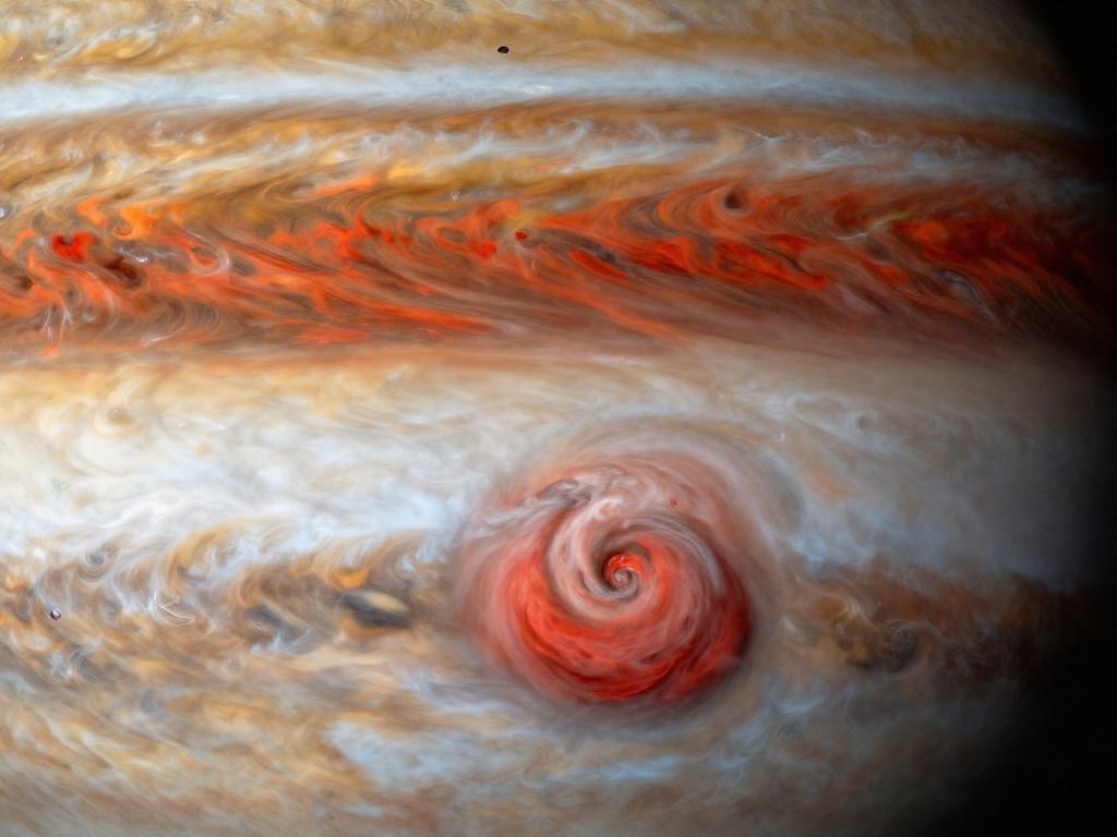 Close-up of Jupiter's Great Red Spot showing swirling red and orange storm clouds